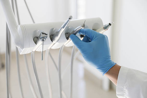 Professional Tooth Extraction technician working in Ocean Springs, MS